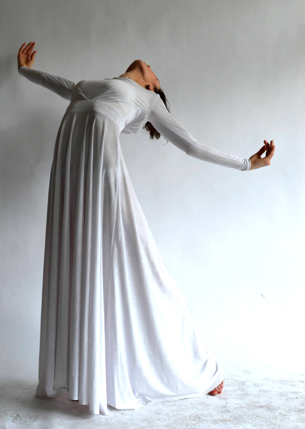 Woman Wearing White Long-sleeve Dress